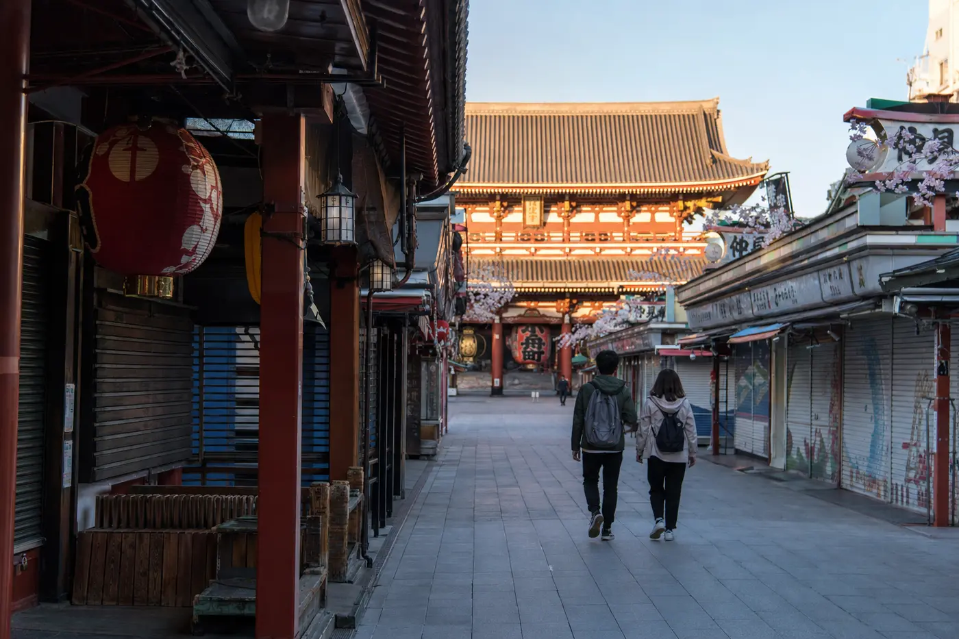 Travelers walking toward Senso-ji in Asakusa early in the morning