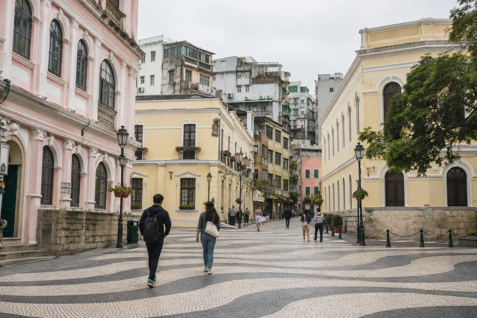 Travelers walking through Macau's historic center among Portuguese-style civic buildings