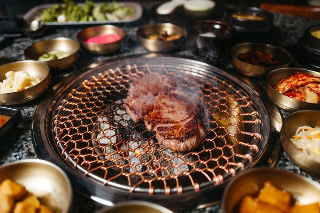 Korean barbecue cooking on a tabletop grill