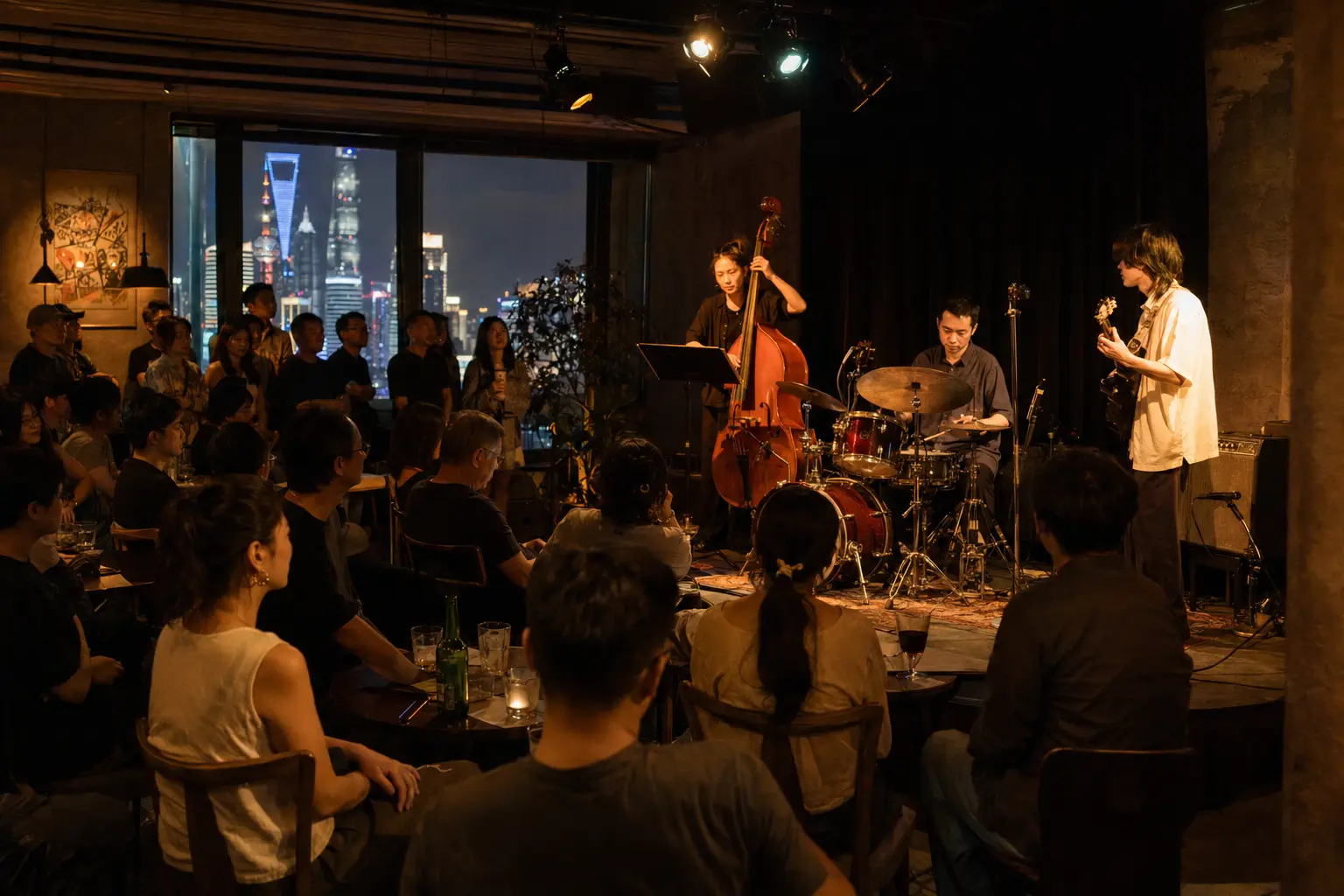 Audience listening to a small live band at a Shanghai music venue