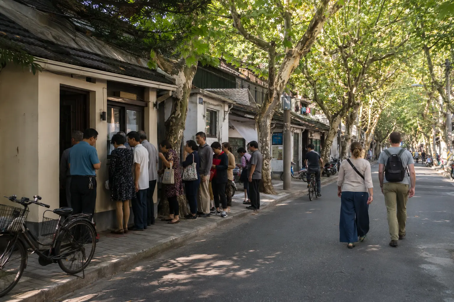 Travelers walking past a local breakfast queue on a tree-lined Xuhui street