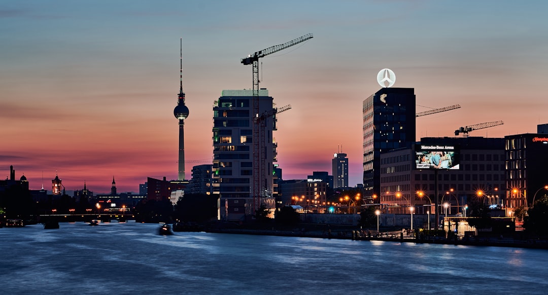 a view of a city at night from a river — Ireland Digital Nomad Visa: Requirements & How to Apply