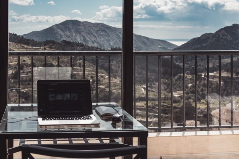 Working on my Macbook in the quiet Spanish town of Sella in the Costa Blanca. Incredible views down to the ocean. Search 'Alojamientos Turisticos Isa i Toni' to book apartment. — productivity tips