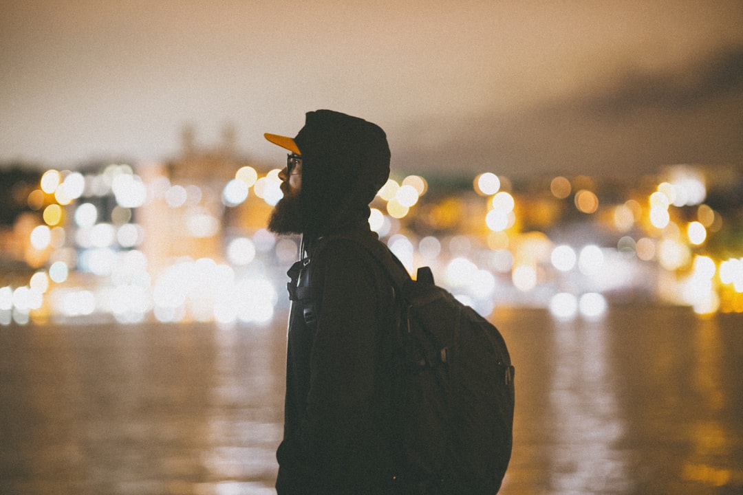 silhouette of person wearing black hoodie and black knit cap — How to Overcome the Fear of Failure