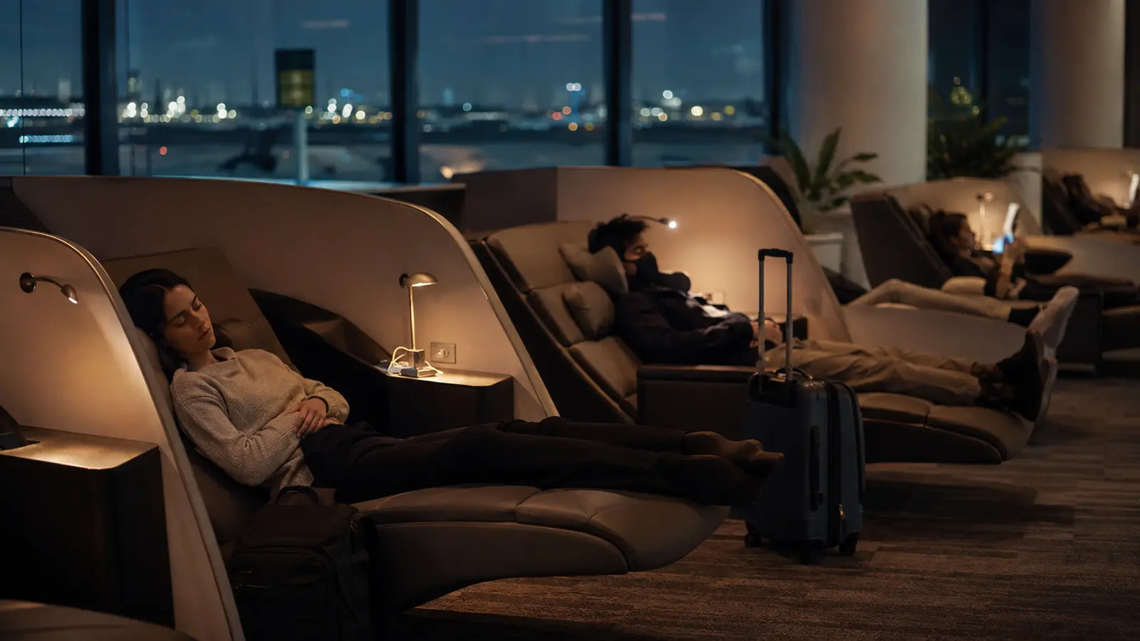 Quiet airport snooze lounge with reclined seats for connecting passengers