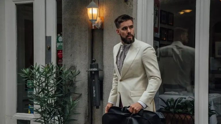 Traveler carrying a garment bag for a suit