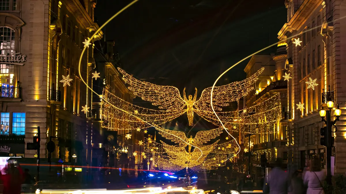 Christmas lights and light trails along Regent Street in London