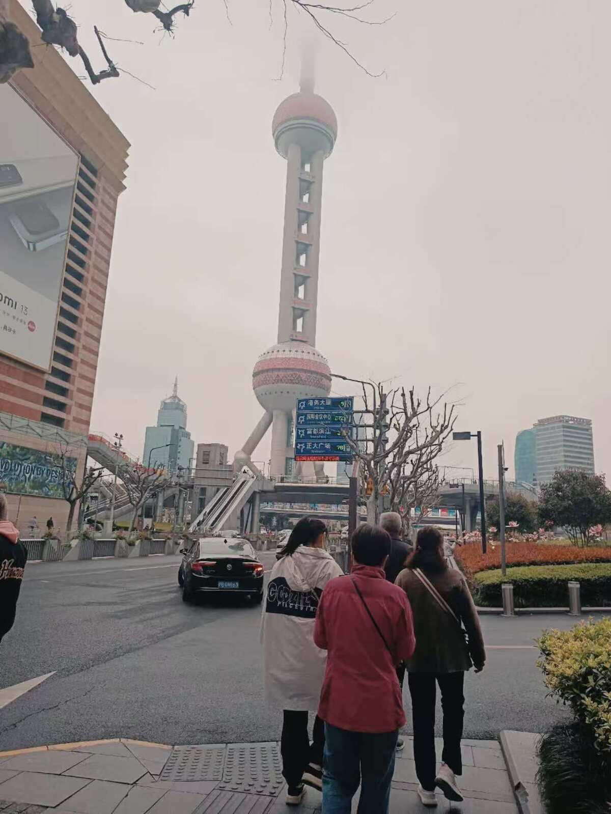 Street-level view of the Oriental Pearl Tower in Lujiazui, Shanghai
