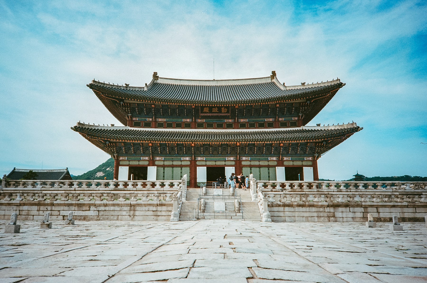 Main gate and stone courtyard at Gyeongbokgung Palace in Seoul