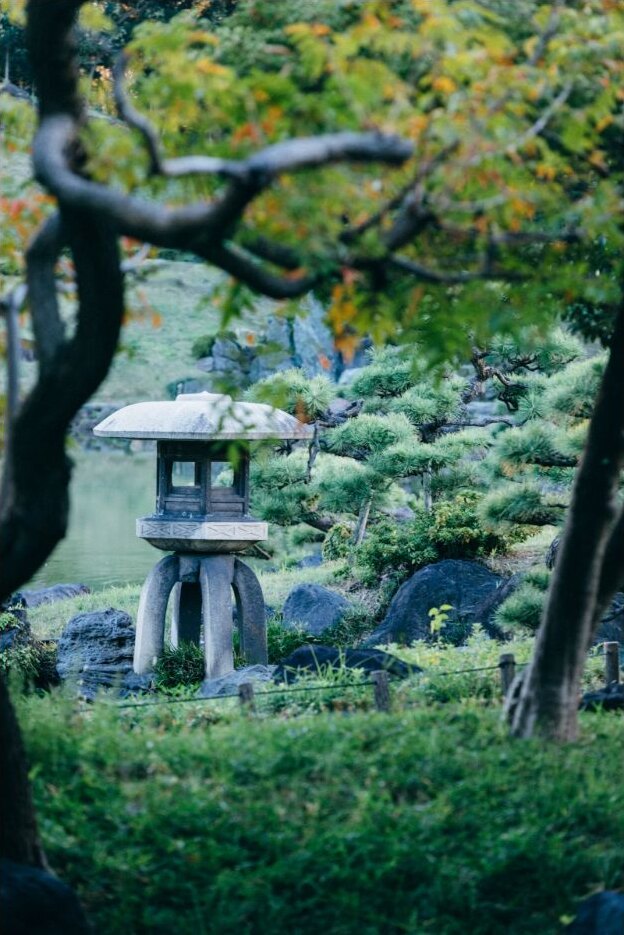 A stone lantern in a Japanese garden in Tokyo
